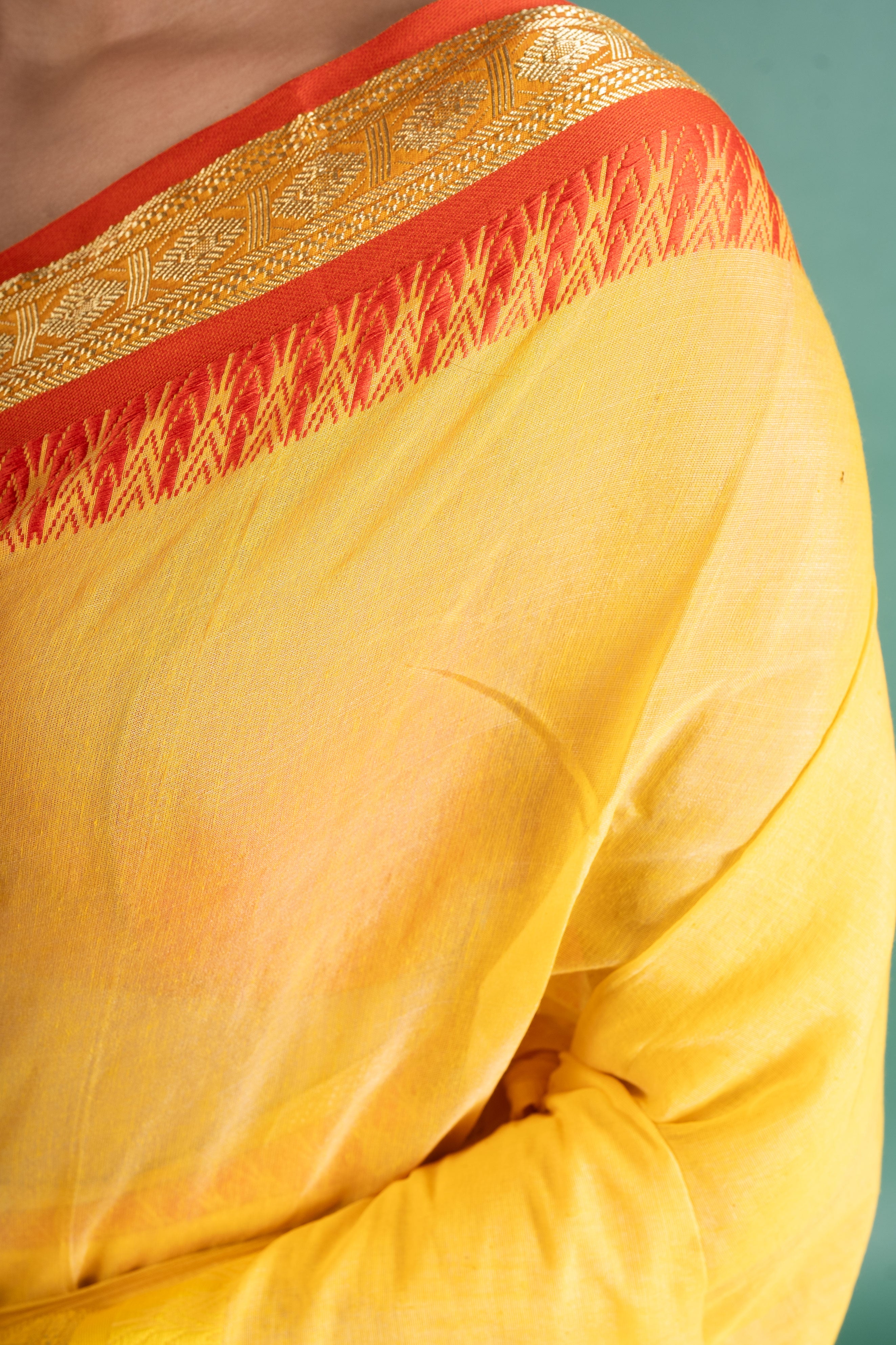 Surya Kiran Yellow Handloom Saree with Zari Temple Border