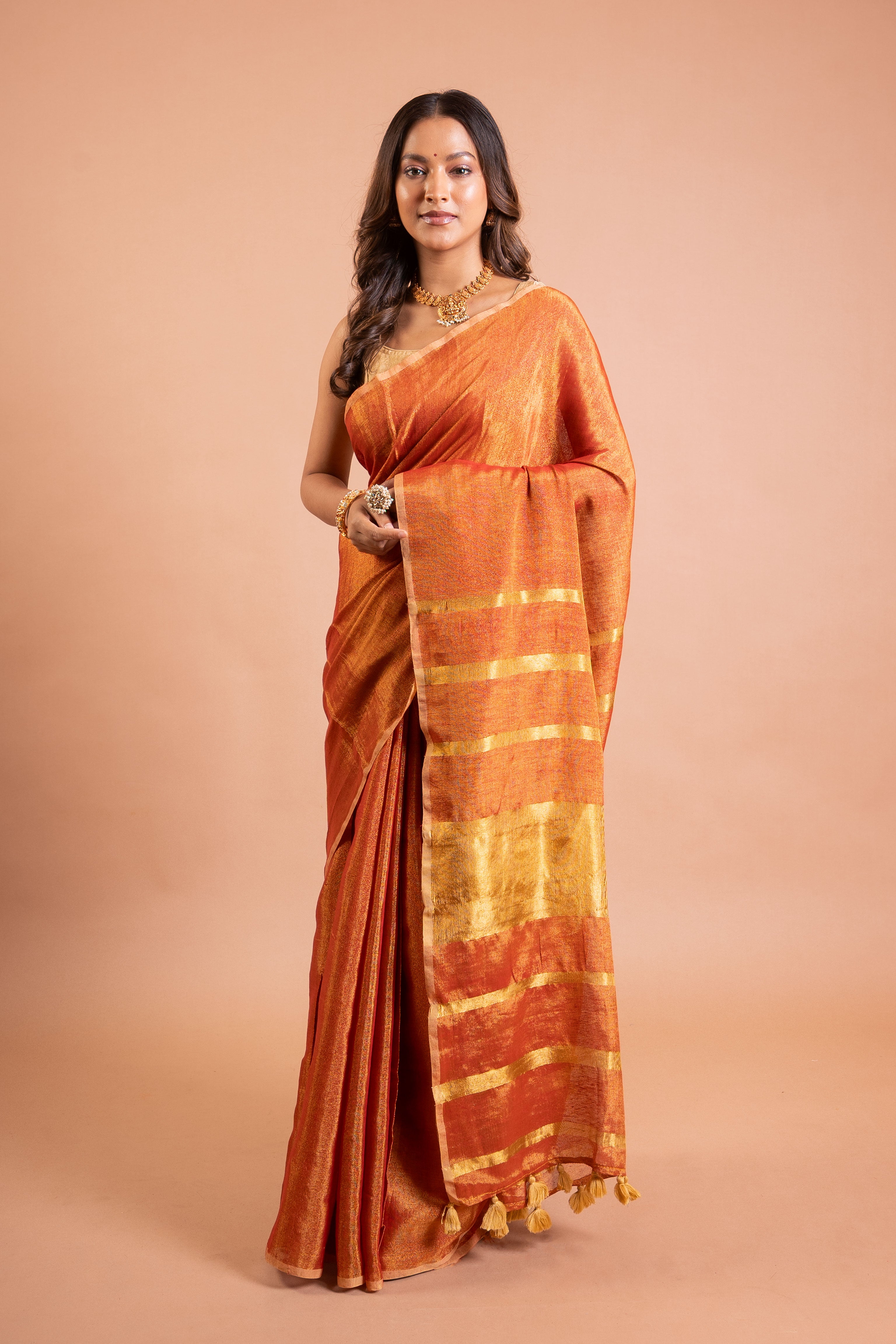 Amber Rust Linen Tissue Saree with Gold Stripe Pallu