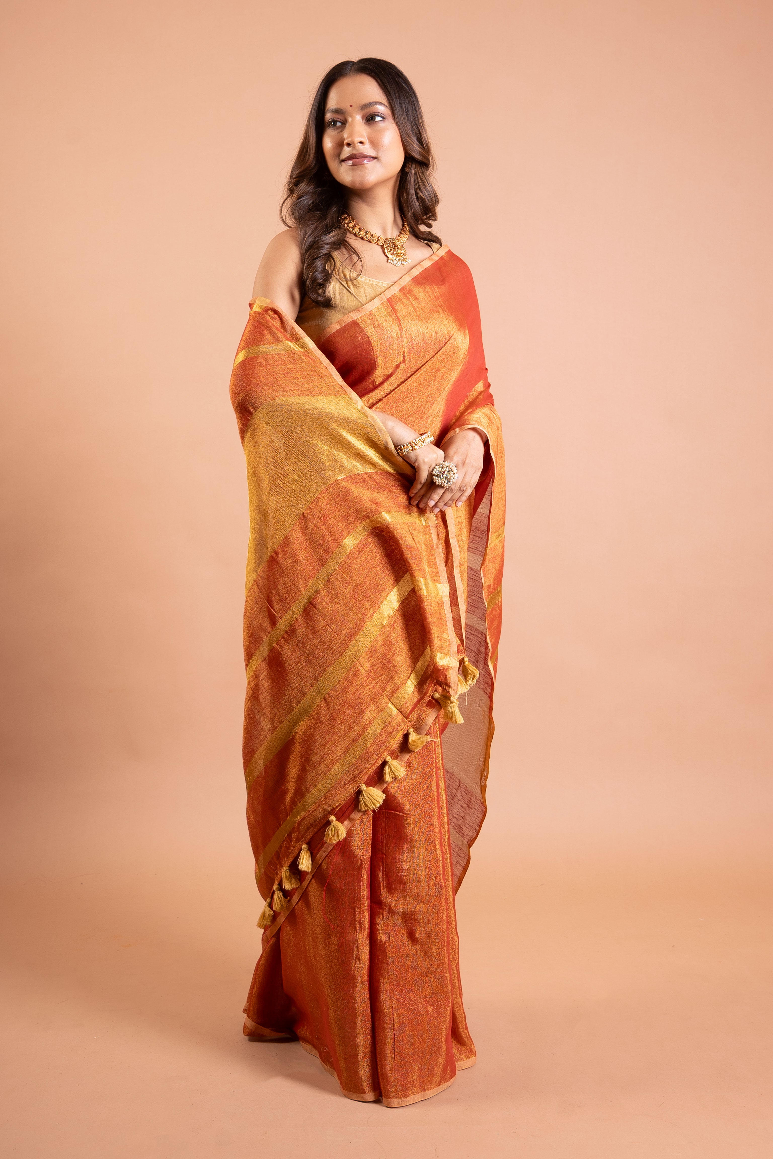 Amber Rust Linen Tissue Saree with Gold Stripe Pallu