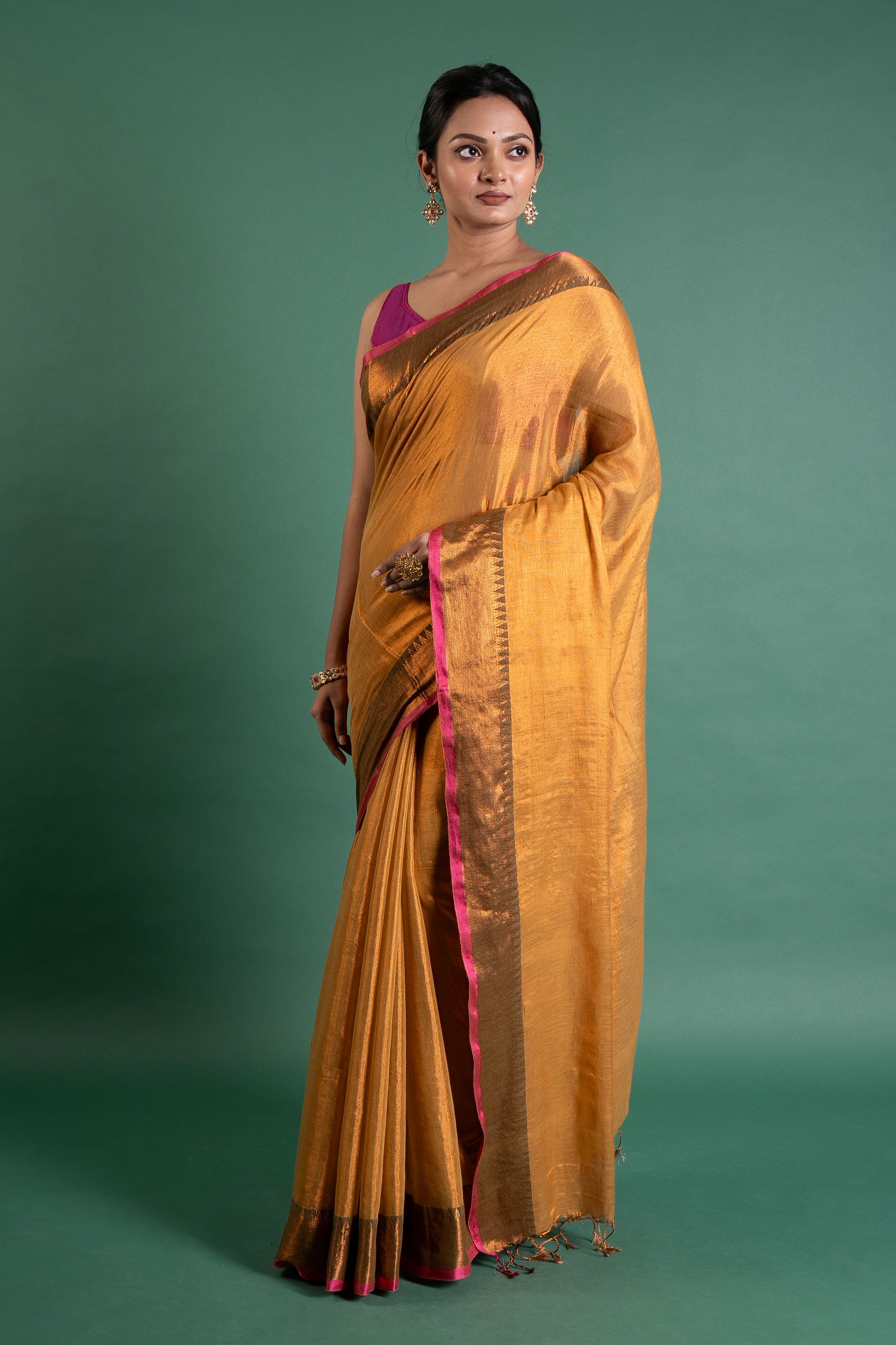 Kanaka Glow Antique Gold Tissue Saree with Zari Border