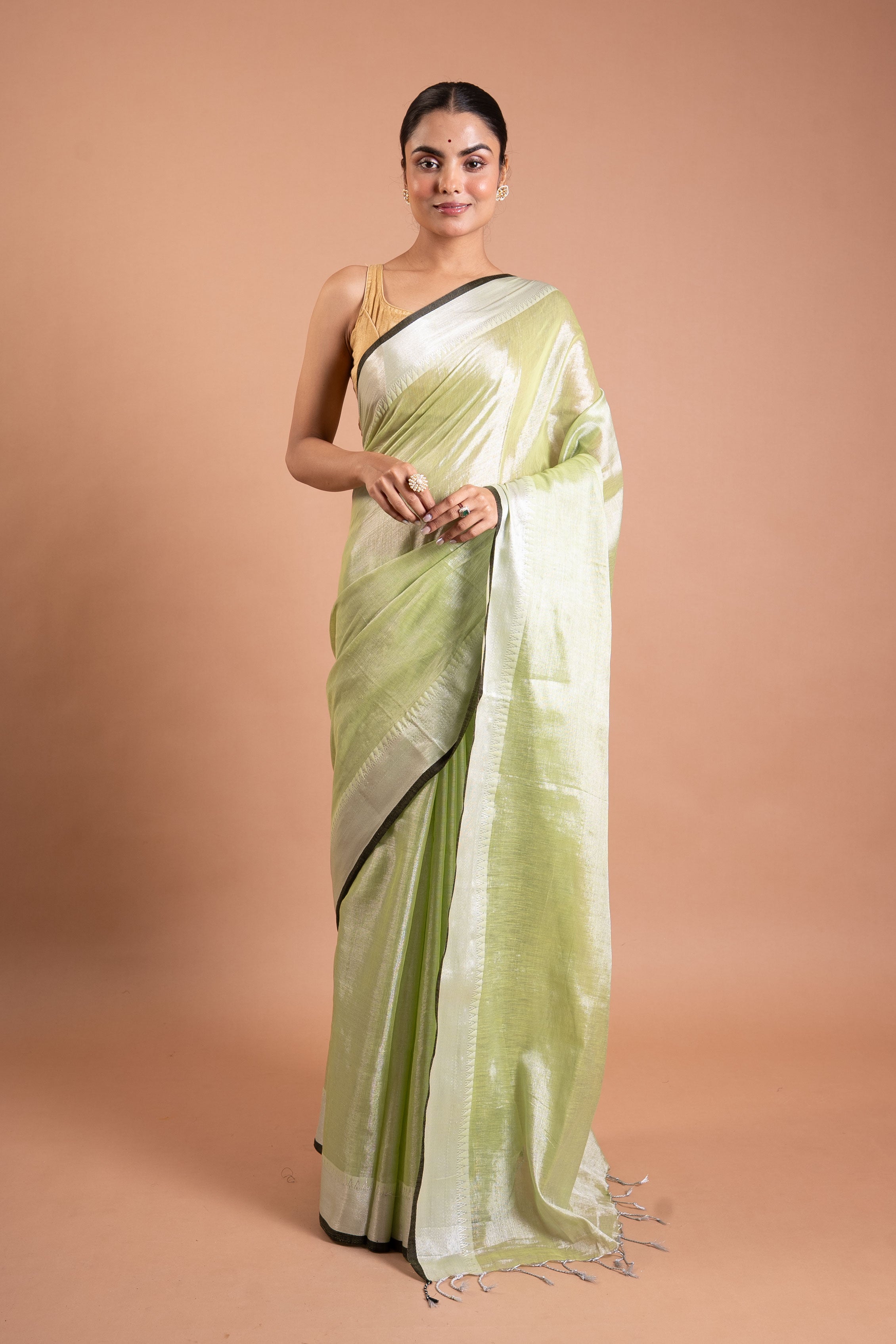 Misty Pistachio Pure Tissue Saree with Silver Sheen Border