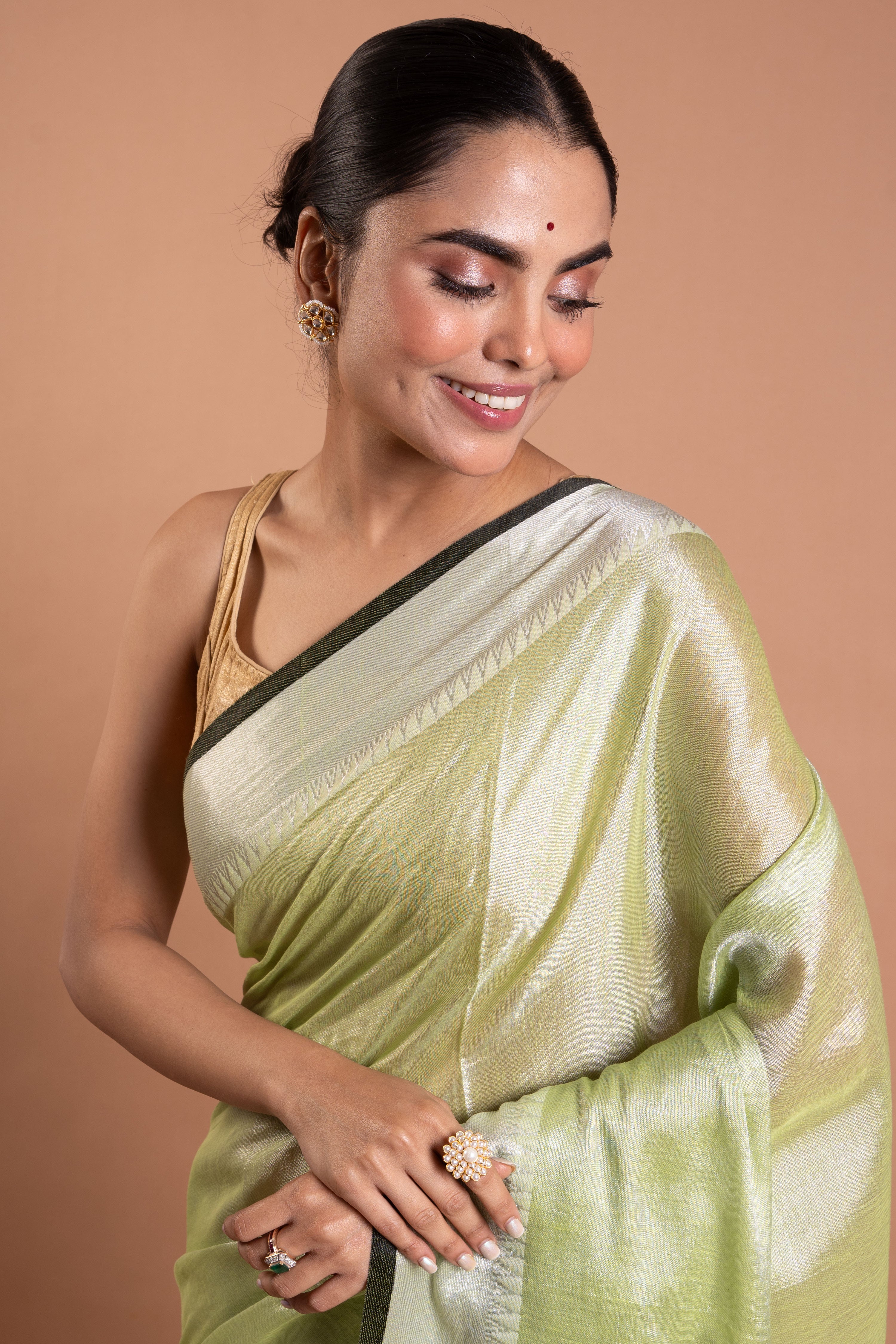 Misty Pistachio Pure Tissue Saree with Silver Sheen Border