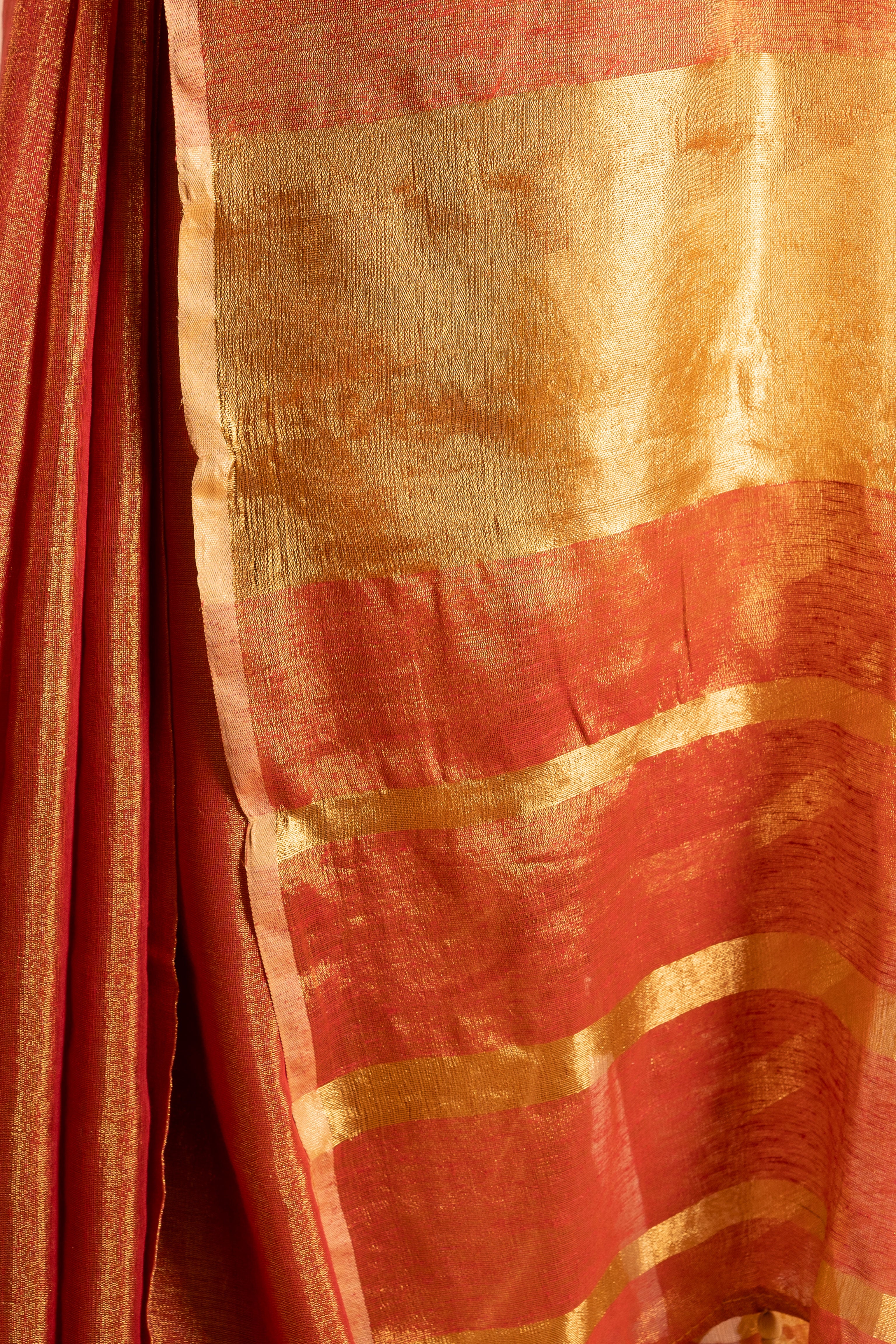 Amber Rust Linen Tissue Saree with Gold Stripe Pallu